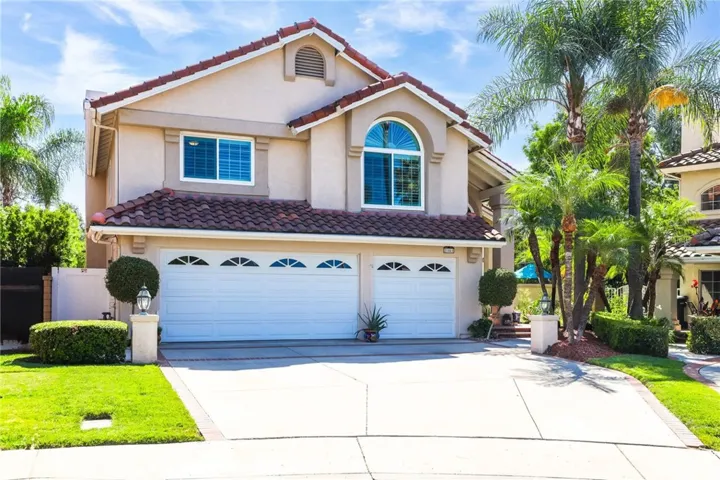 Front view showcasing the home’s elegant façade and inviting entryway.
