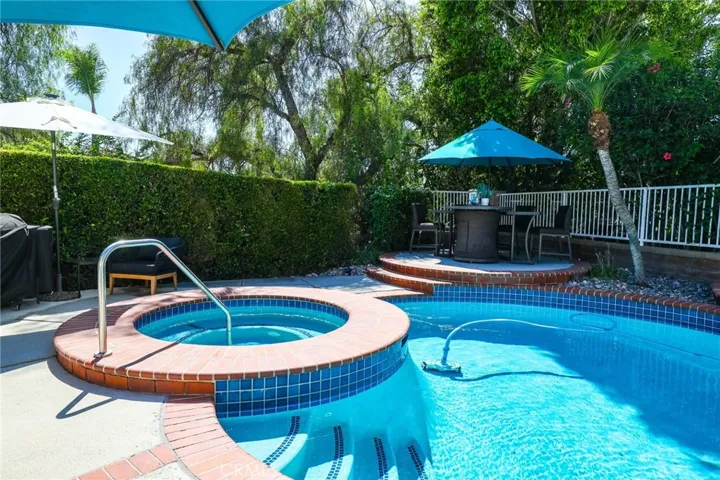 Relaxing spa area adjacent to the pool, ideal for unwinding after a long day.