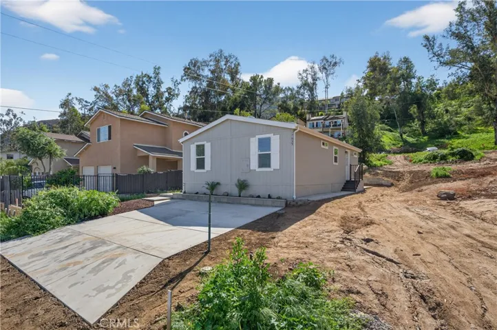 Brand new driveway! "For Sale" sign was digitally removed from this photo.