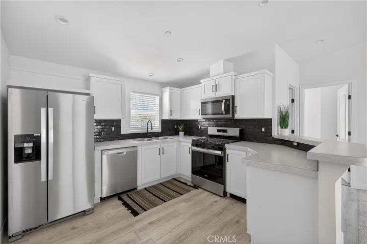 The contemporary kitchen is the centerpiece of this​​‌​​​​‌​​‌‌​​‌​​​‌‌​​​‌​​‌‌​​‌‌​​‌‌​​​​ home
