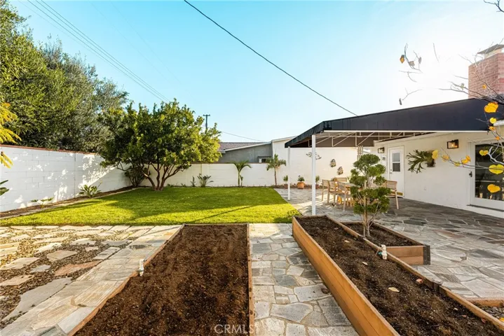 Raised planter boxes with sprinklers
