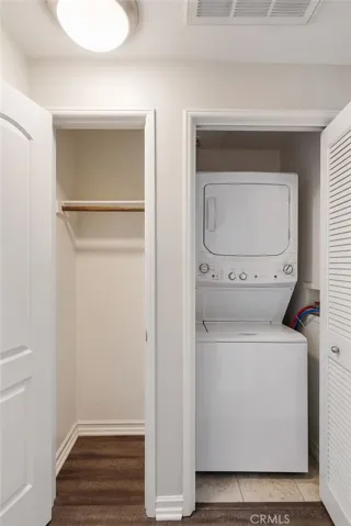Closet and washer dryer in hallway