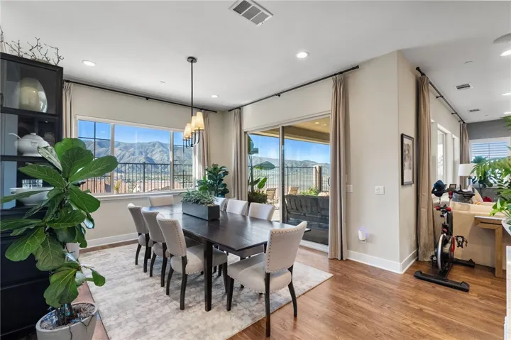 Formal dining area with spectacular views and access to the California room for indoor-outdoor entertaining.