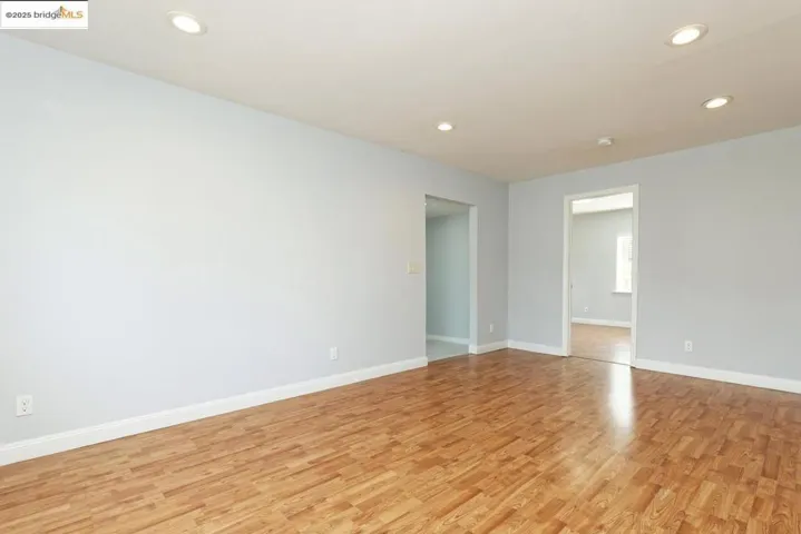 Spare room with recessed lighting and light wood-style floors