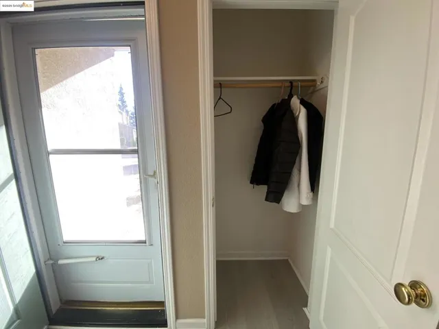 Entryway with wood finished floors