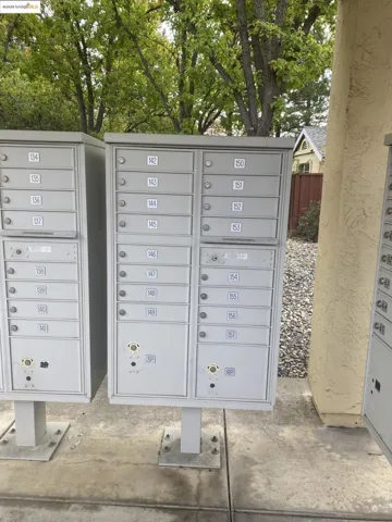 View of home's community featuring mail area