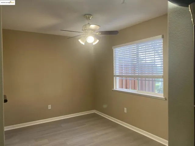 Dinning room with light wood-type flooring and ceiling fan