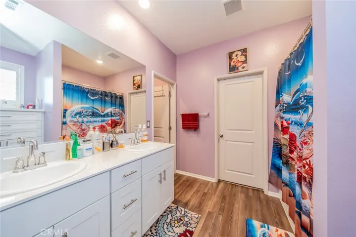 Master bathroom with walk-in closet