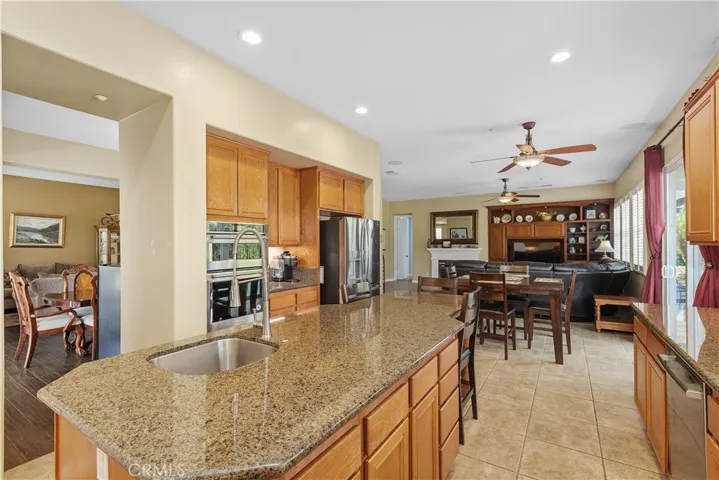 The kitchen as easy access to the dining room and the family room.