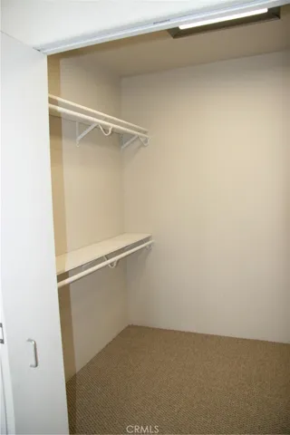 Walking closet in bedroom. Picture prior tenant