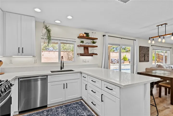 Soft-Closing White Cabinets and Drawers, Farmhouse Sink and Faucet