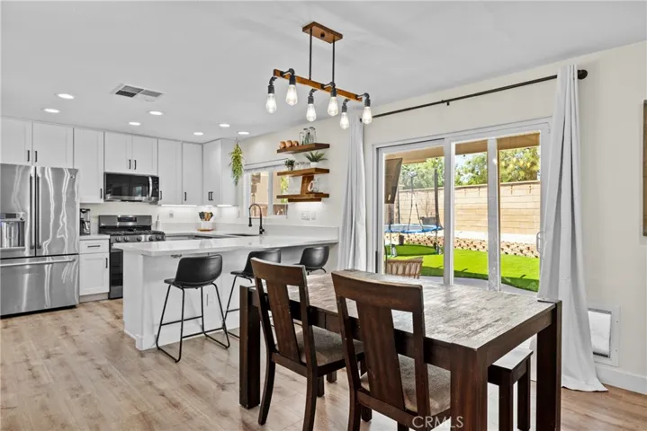 Casual or Formal Dining with Sliding Glass Door Access to Backyard