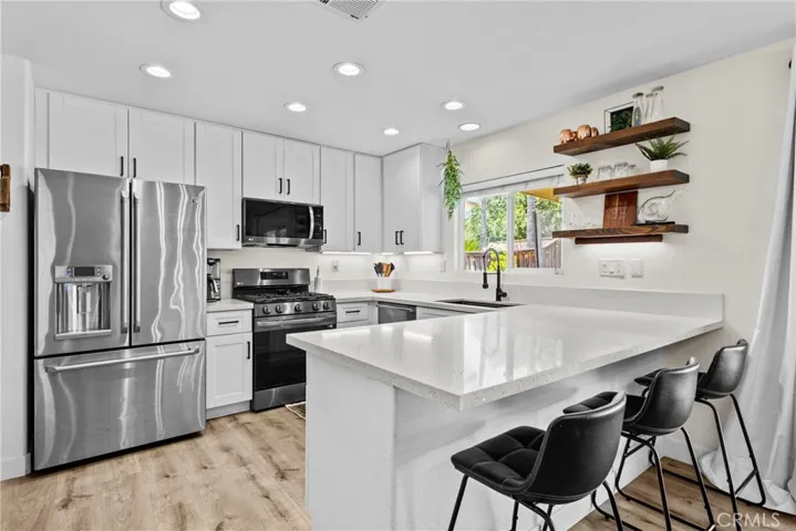 Bright Kitchen-Newly Renovated with Quartz Countertops and Stainless Steel Appliances