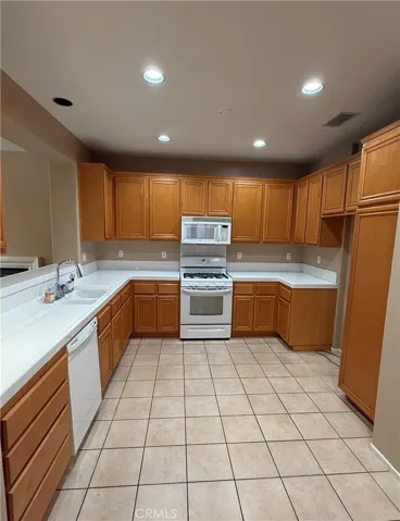 Large, open kitchen offers plenty of space to prep and store.