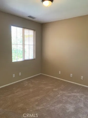 One of the secondary bedrooms.