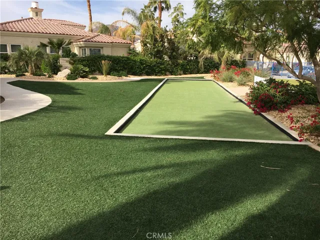 Bocce ball and golf clubs available in the clubhouse