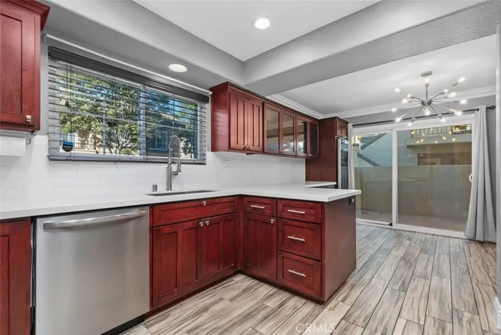Kitchen opens to dining room