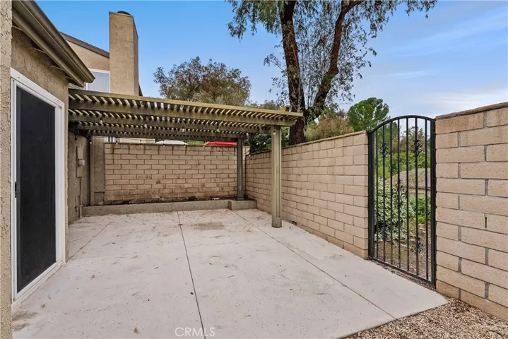 Enclosed and covered back patio.