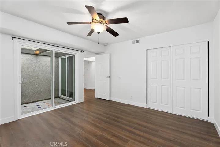 Bedroom #2 with access to the atrium.