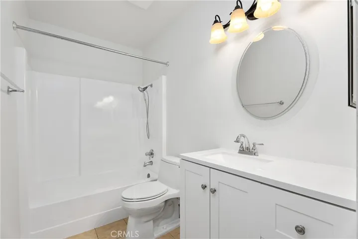 Updated secondary bathroom with new vanity.