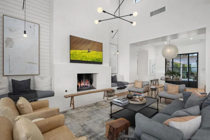 The finish quality is off the chart: custom lighting throughout, shiplap niches, hand plaster surround on fireplaces...