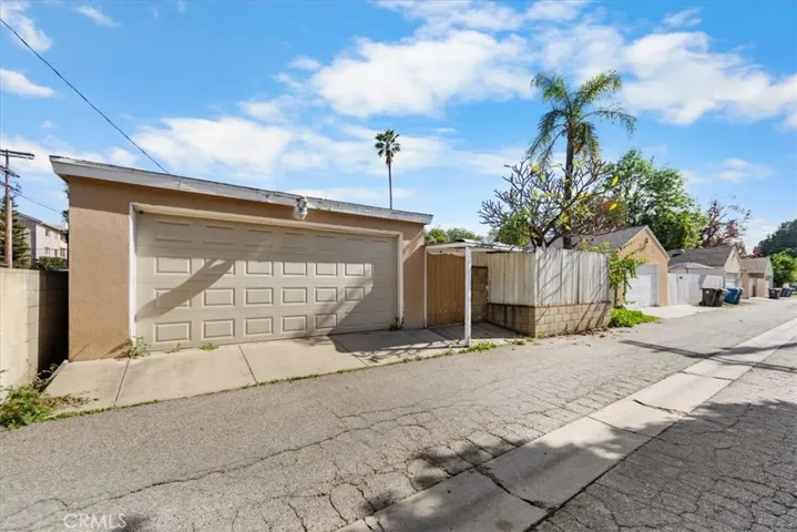 Alley View of Garage Door and backyard gate