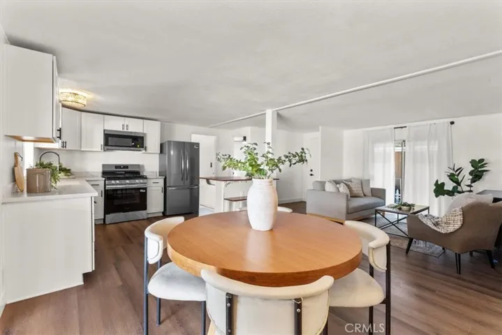 Kitchen of the home at 300 N Rampart St TRAILER 127, Orange, CA. Showcases updated appliances and generous cabinet space