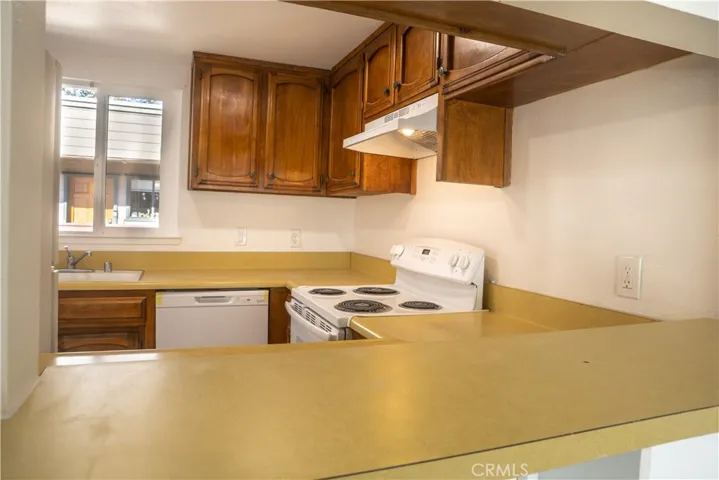 Kitchen layout has "great bones" and would be an easy update.