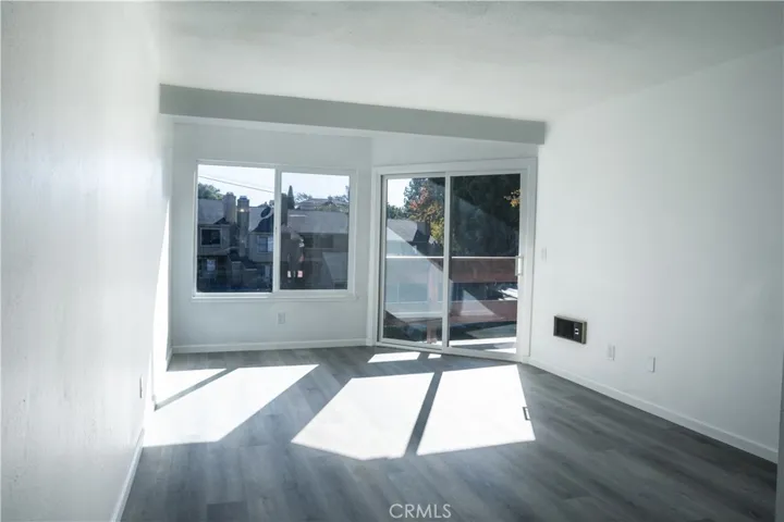 New luxury vinyl plank flooring and fresh white paint throughout, along with custom Milgard windows that are white in the interior and espresso on the exterior to match both color palettes.