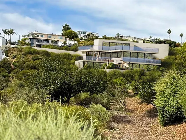 Rendering to show potential location of a home with access from Alisos Avenue looking from the Marlin Drive side of the lot.