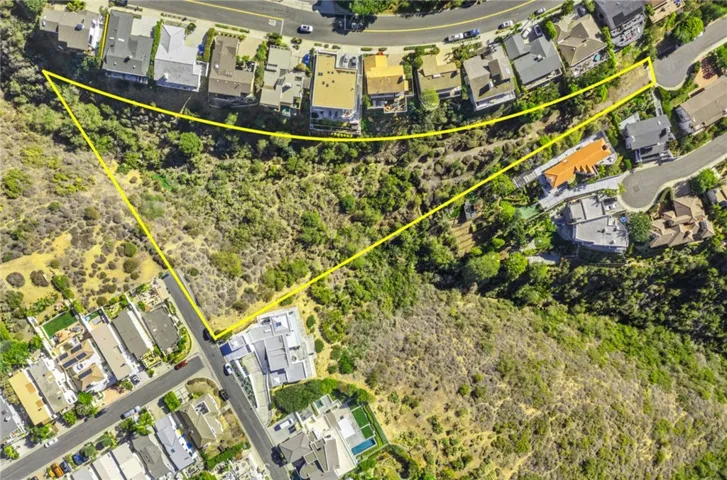 Approximate outline of property lines. Triangular shaped lot is the buildable site with access from Alisos Avenue.