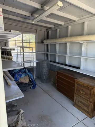 STORAGE ROOM OFFOF ENCLOSED PATIO