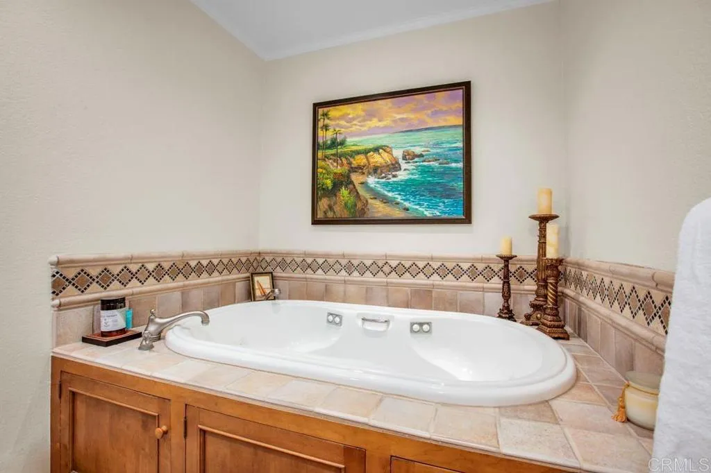 Luxurious jetted tub in primary bathroom