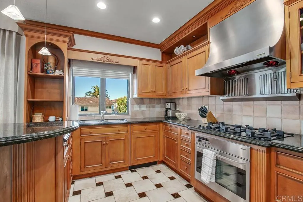 Beautifully appointed kitchen with high-end appliances.