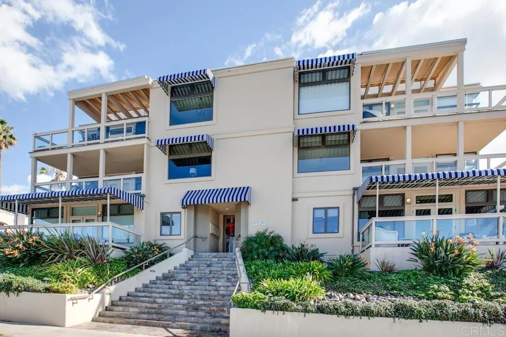 This elegant, ocean view condo is elevated above the street offering glorious views!