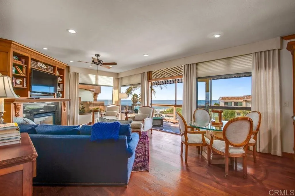 Living Room with fireplace and lovely sit-down view of the ocean!
