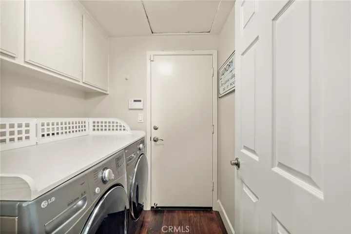 Indoor laundry room. with plenty of storage.