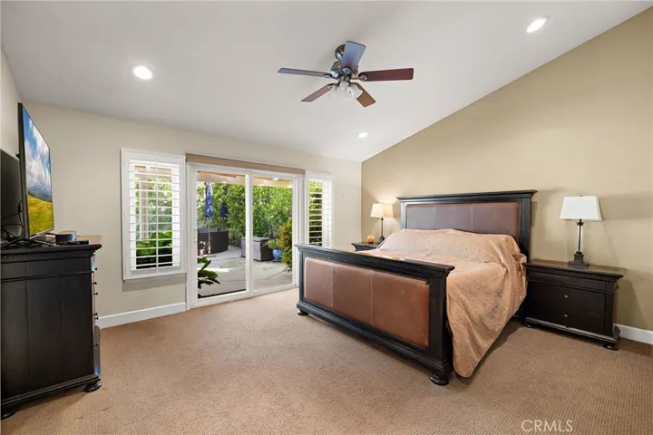 Master suite with entrance to the backyard.