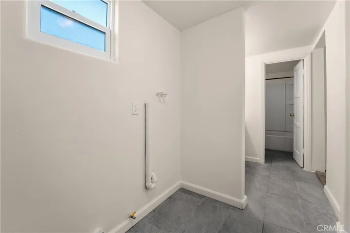 Inside Laundry next to bathroom for added convenience