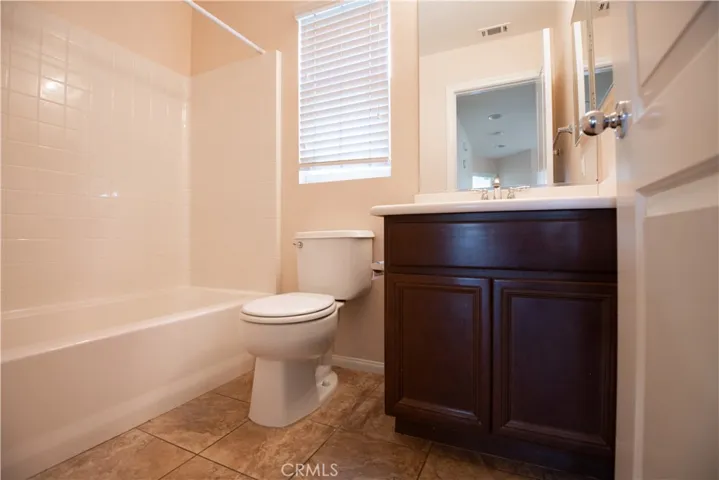 Full bath upstairs shared by secondary bedrooms