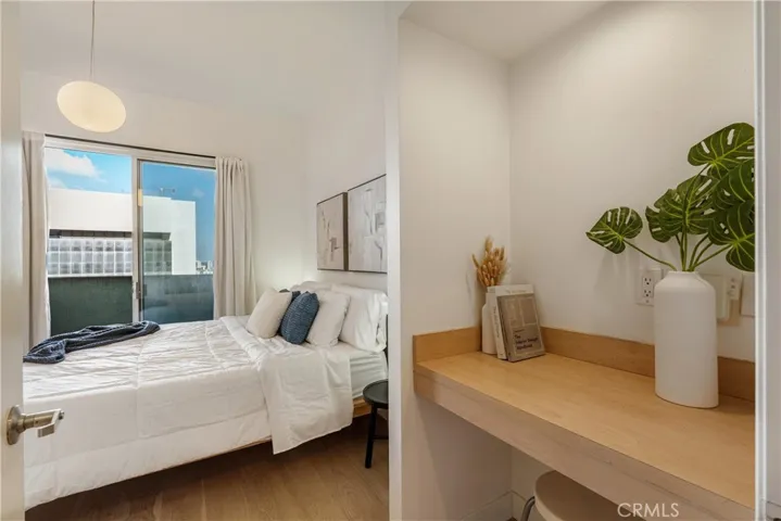 Desk area leading towards the bedroom