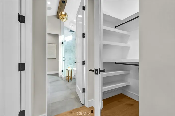 PRIMARY SUITE HIS N HER CLOSETS