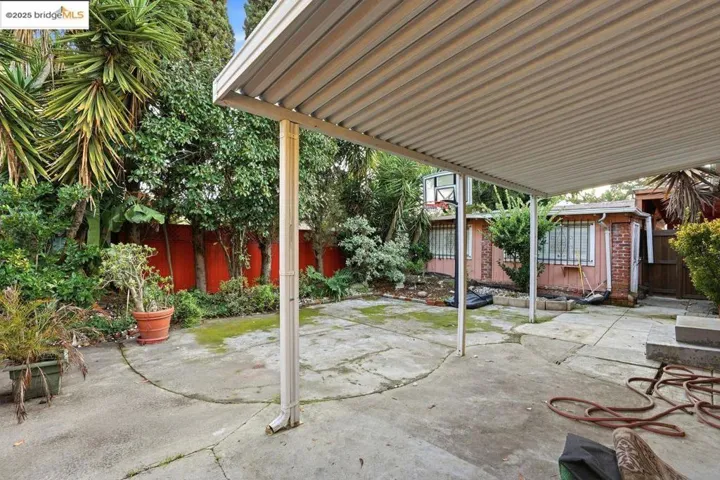 Fenced backyard featuring a patio area
