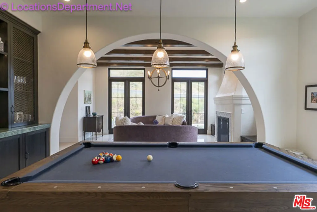 Bar and pool table that turns