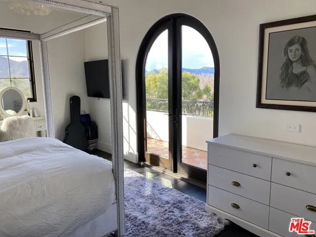 Bedroom 2 w/ views and ensuite