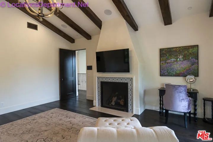 Primary bedroom w/ fireplace