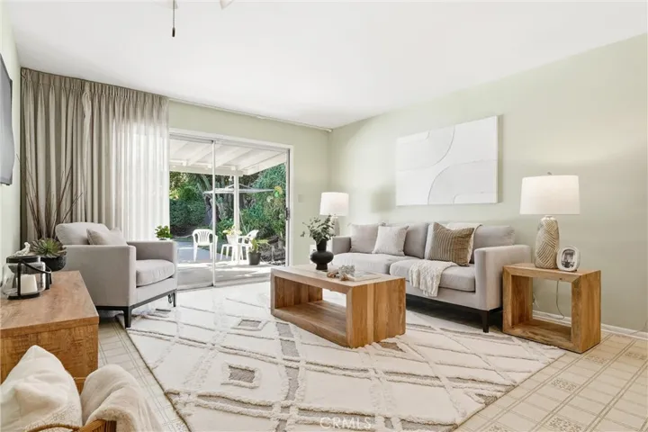 Family Room with sliding glass door which leads to the private backyard retreat!
