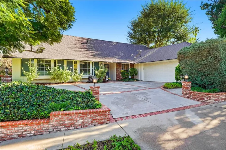 Beautifully maintained family home for nearly 50 years..stunning curb appeal...NEW roof and exterior paint!