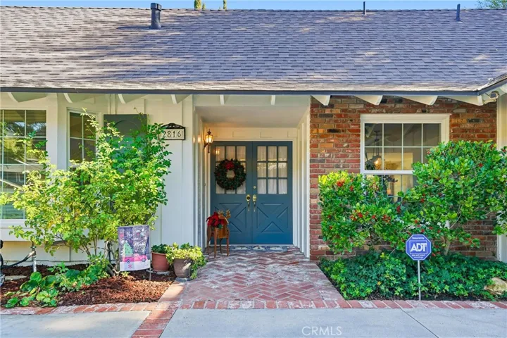 Step on up to this amazing front porch with double door front entry!
