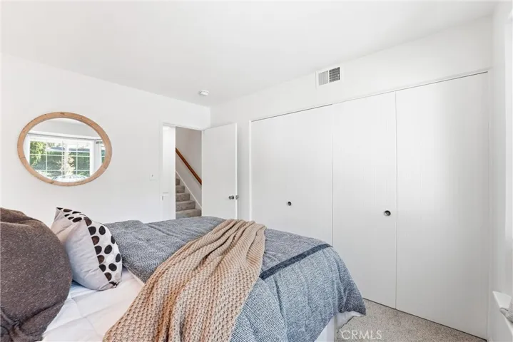 Downstairs Bedroom #2 has a large wall of closets!